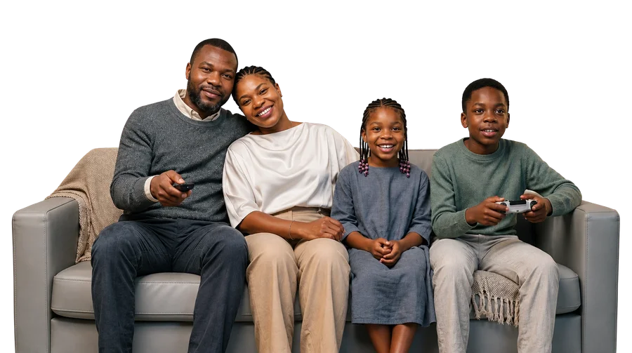 A happy family relaxing at home with solar power from YouNick Energy